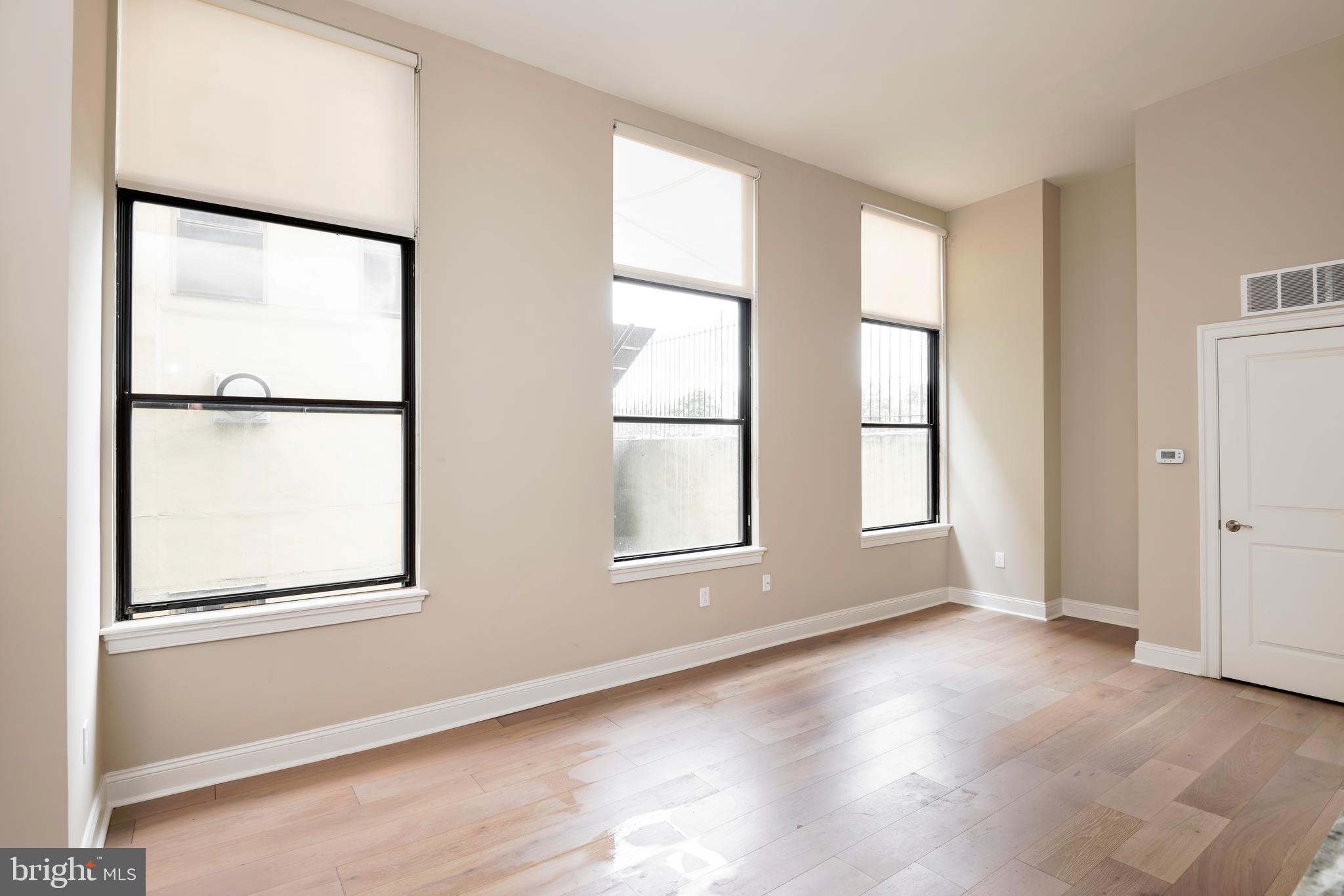 33 Letitia Street, Unit 306 Philadelphia, PA 19106 - Photo 22 of 24 an empty room with windows and closet