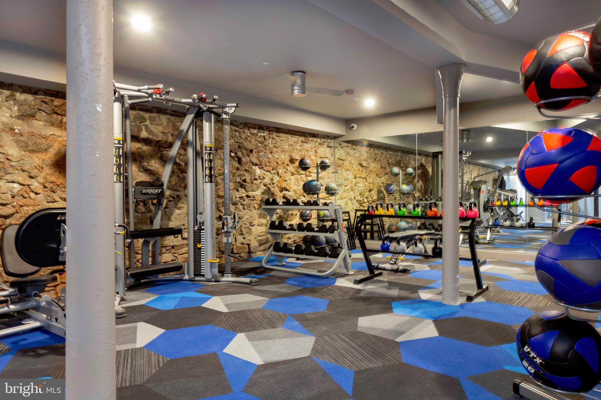 33 Letitia Street, Unit 306 Philadelphia, PA 19106 - Photo 3 of 24 a view of gym equipment and children play room