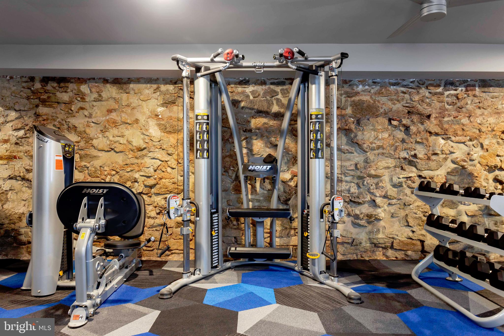 33 Letitia Street, Unit 306 Philadelphia, PA 19106 - Photo 4 of 24 a view of a living room with furniture and a fireplace