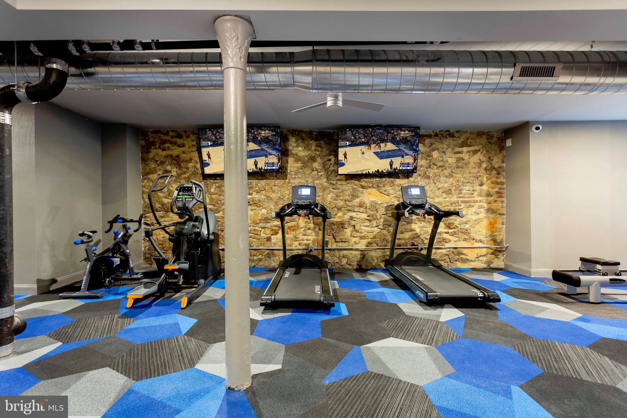 33 Letitia Street, Unit 306 Philadelphia, PA 19106 - Photo 7 of 24 a view of a room with gym equipment