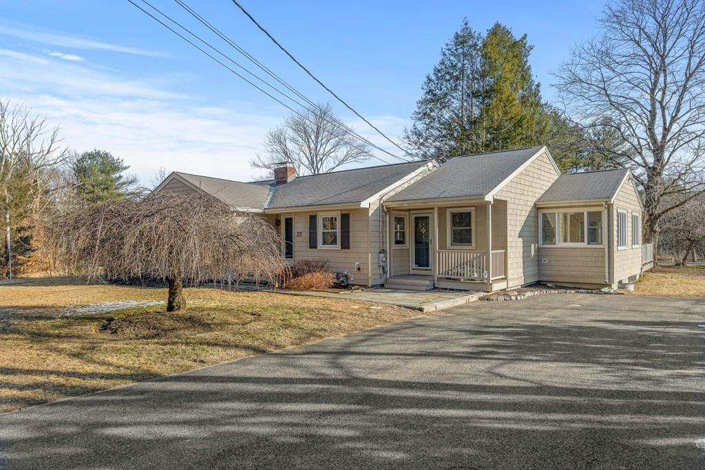 23 Williams Road Concord, MA 01742 - Photo 26 of 32 a house with trees in the background