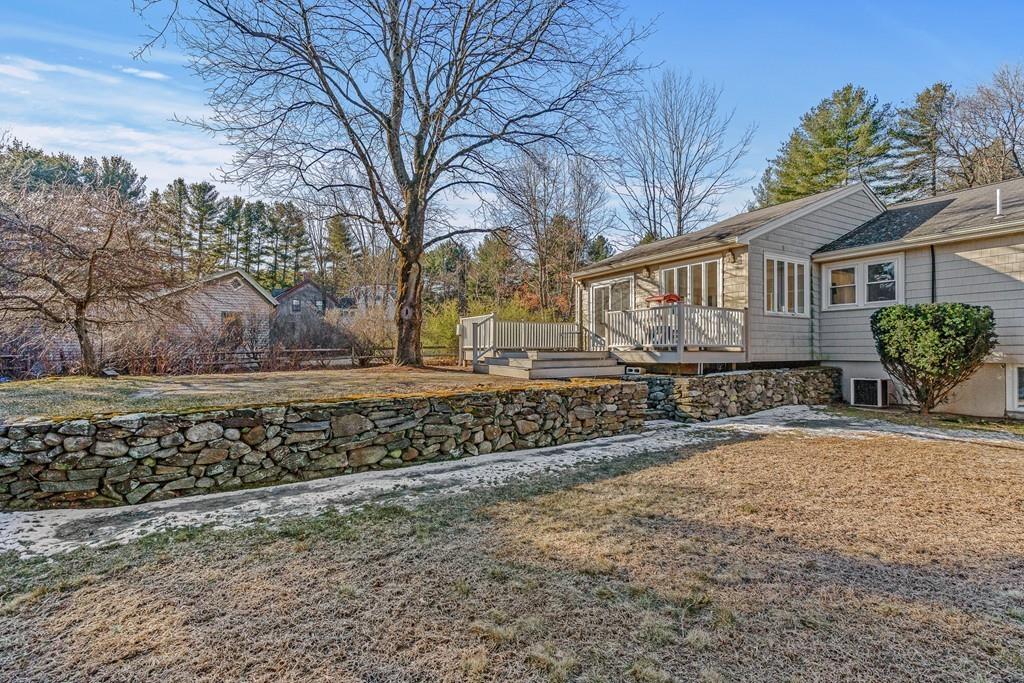 23 Williams Road Concord, MA 01742 - Photo 32 of 32 a front view of a house with garden