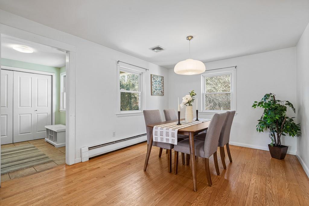 23 Williams Road Concord, MA 01742 - Photo 8 of 32 a view of a dining room with furniture and wooden floor