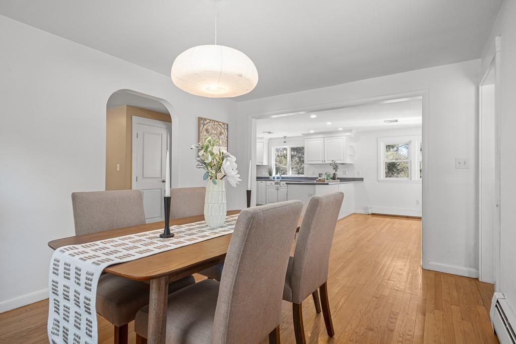23 Williams Road Concord, MA 01742 - Photo 9 of 32 a dining room with furniture and wooden floor