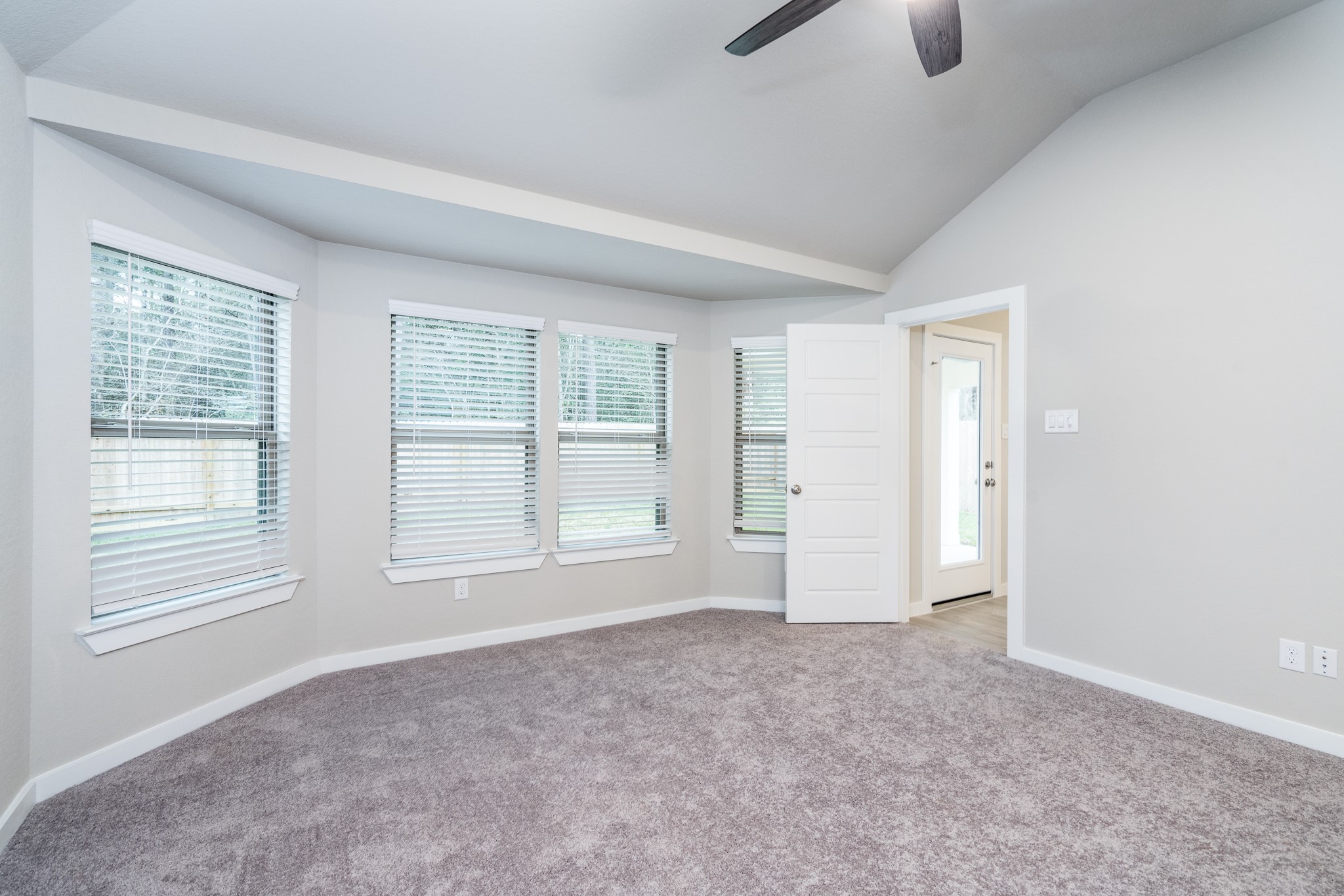 17536 Rosewood Manor Lane New Caney, TX 77357 - Photo 13 of 27 an empty room with windows