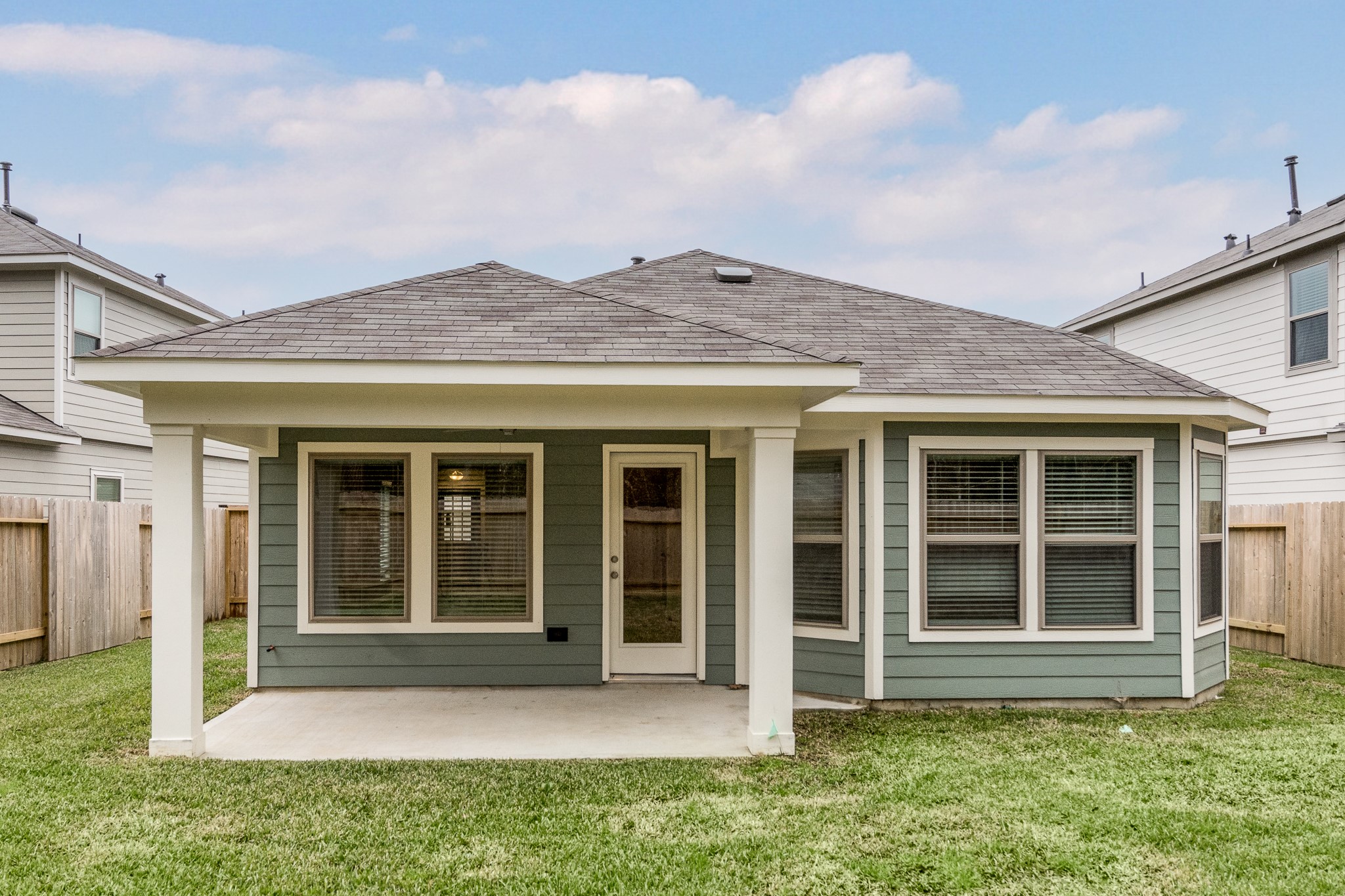 17536 Rosewood Manor Lane New Caney, TX 77357 - Photo 24 of 27 front view of the house with a yard