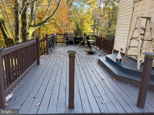 a view of deck with seating area
