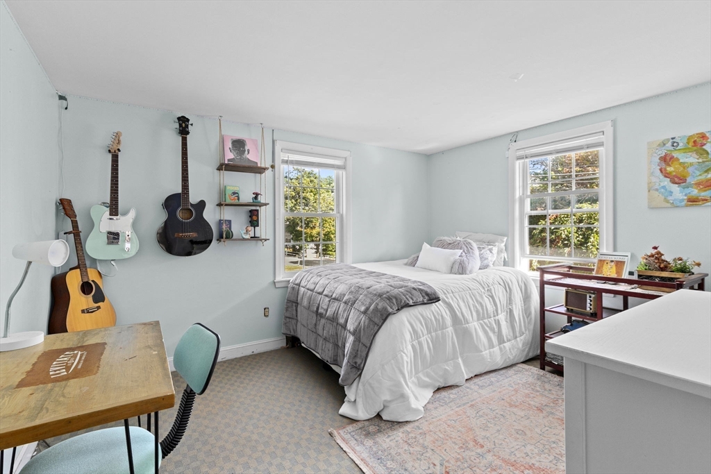 107 Tilden Road Scituate, MA 02066 - Photo 17 of 38 a bedroom with 2 bed and a window