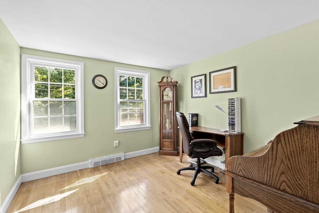 107 Tilden Road Scituate, MA 02066 - Photo 21 of 38 a view of a workspace with furniture and a window