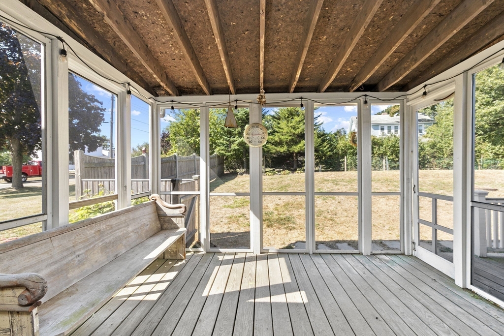 107 Tilden Road Scituate, MA 02066 - Photo 29 of 38 a view of a room with wooden floor and outdoor space
