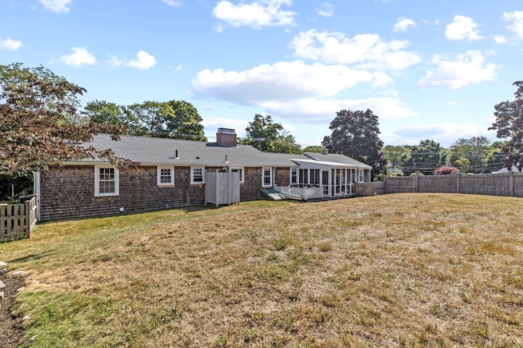 107 Tilden Road Scituate, MA 02066 - Photo 36 of 38 a view of a house with a yard