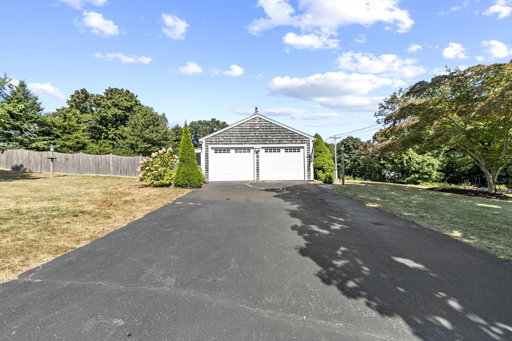107 Tilden Road Scituate, MA 02066 - Photo 38 of 38 a front view of a house with a yard