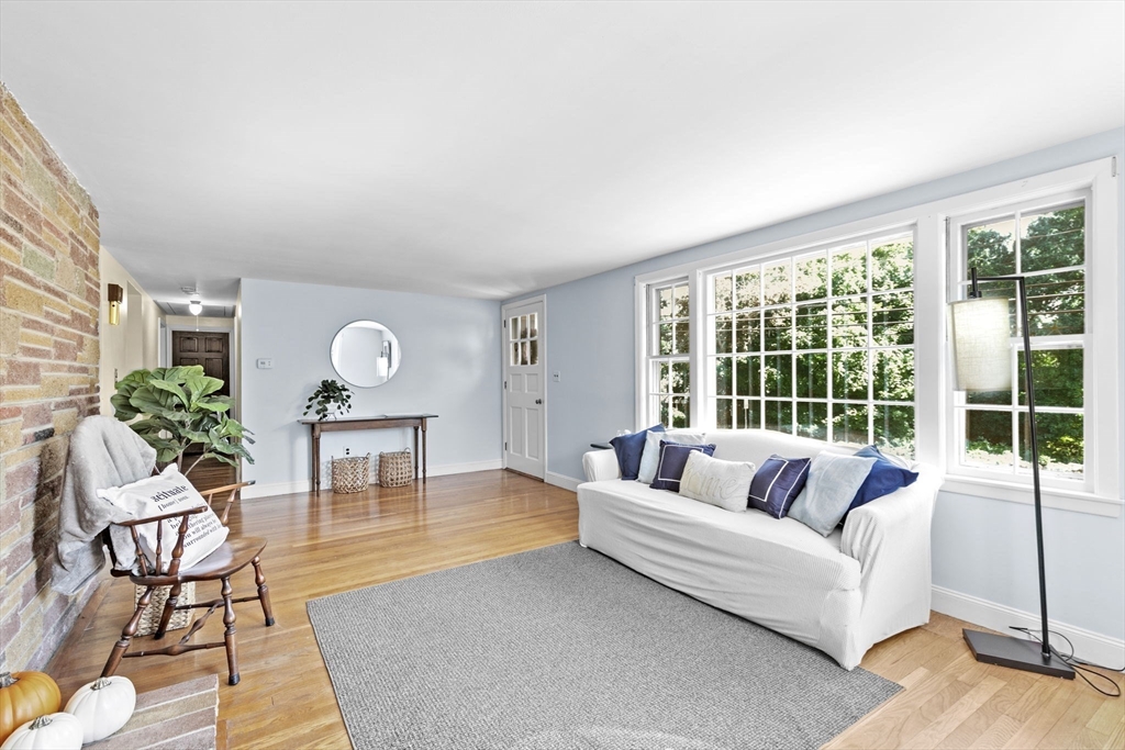 107 Tilden Road Scituate, MA 02066 - Photo 5 of 38 a living room with furniture and a large window
