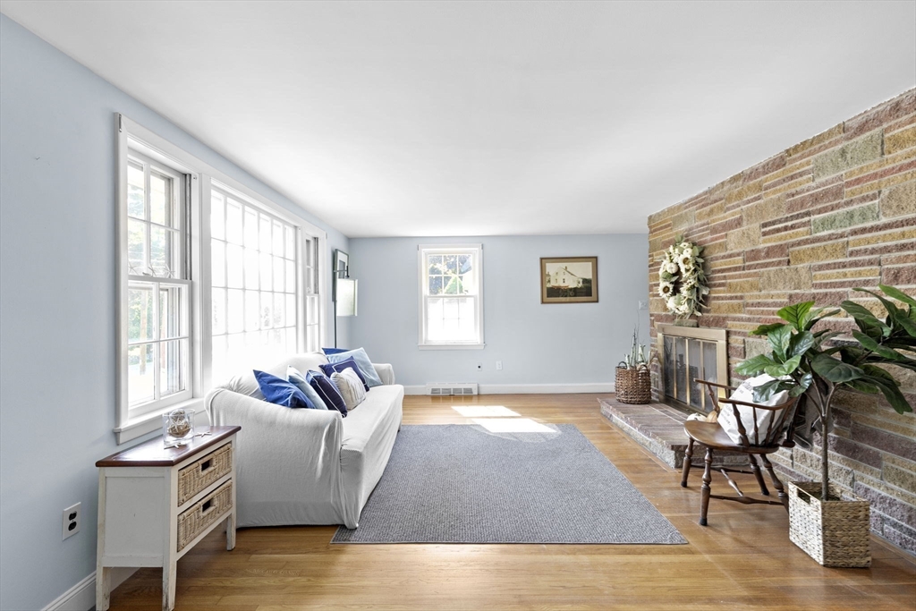 107 Tilden Road Scituate, MA 02066 - Photo 7 of 38 a living room with furniture and wooden floor