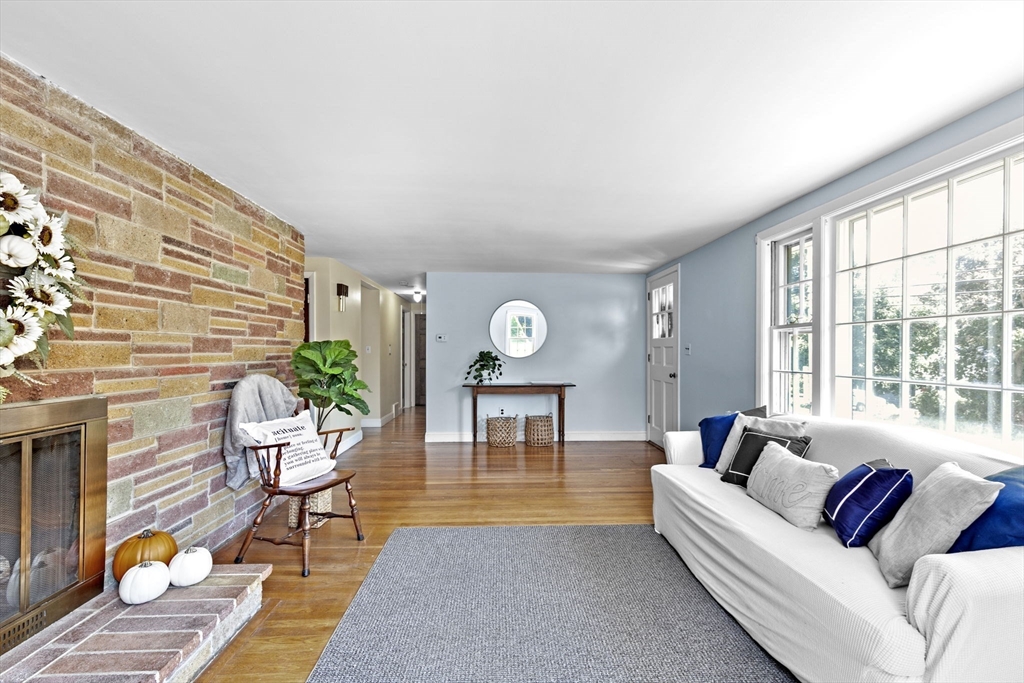 107 Tilden Road Scituate, MA 02066 - Photo 8 of 38 a living room with furniture and wooden floor