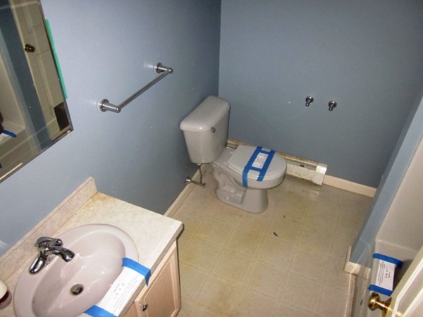 42 Third Street Worcester, MA 01602 - Photo 23 of 26 a bathroom with a sink and a mirror