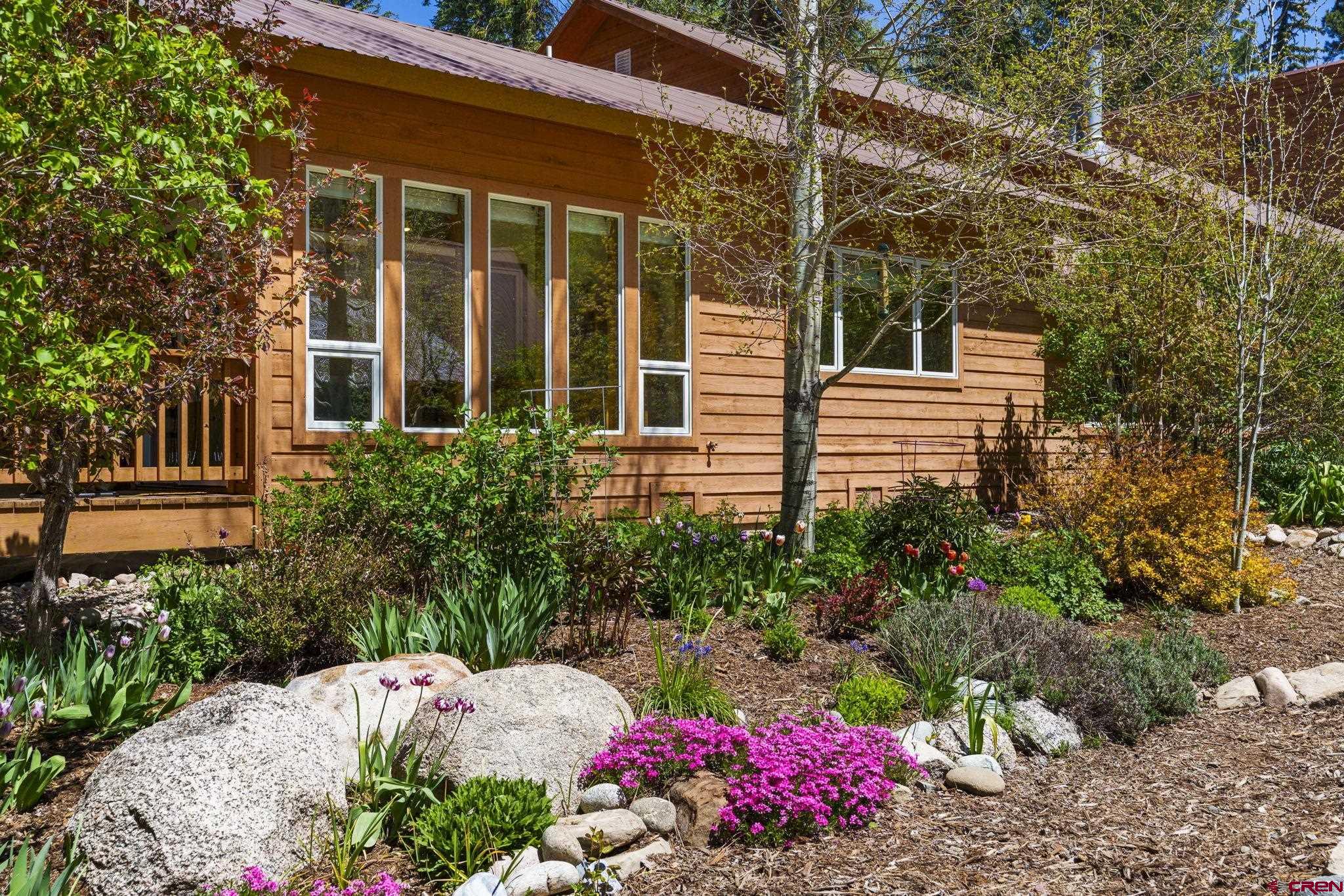 37 Verde Lane Durango, CO 81301 - Photo 1 of 45 a view of a backyard with potted plants