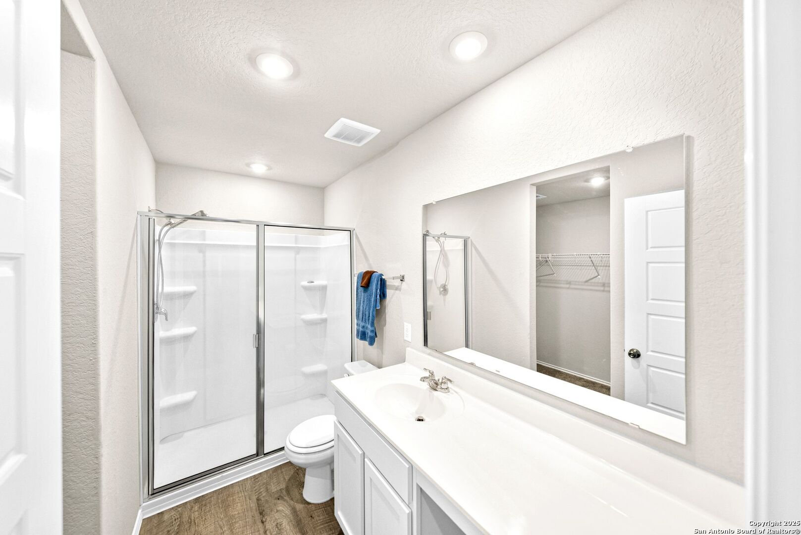 19911 Wyatt Earp Way Lytle, TX 78052 - Photo 16 of 26 a bathroom with a sink a toilet and shower