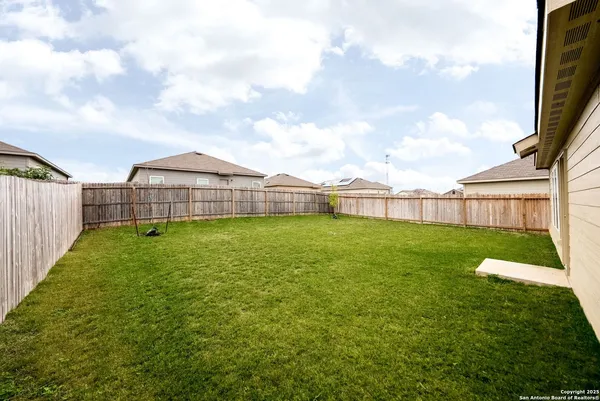 a view of a backyard with a garden