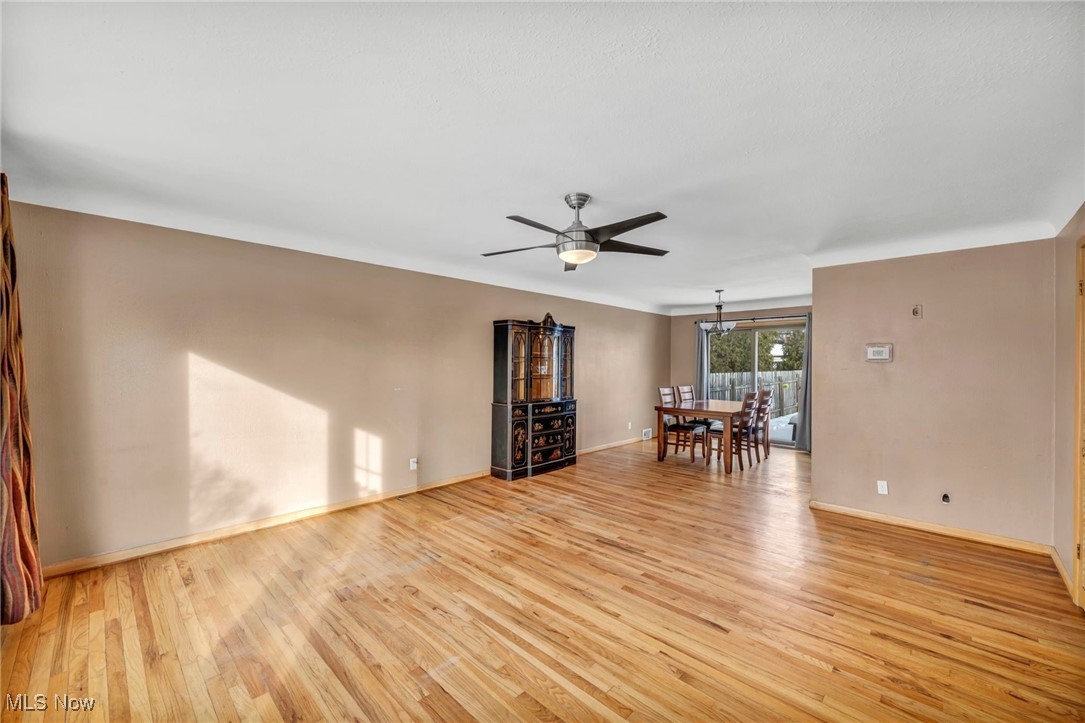 1767 Bellingham Road Cleveland, OH 44124 - Photo 7 of 27 Unfurnished room featuring light wood-style floors and a ceiling fan