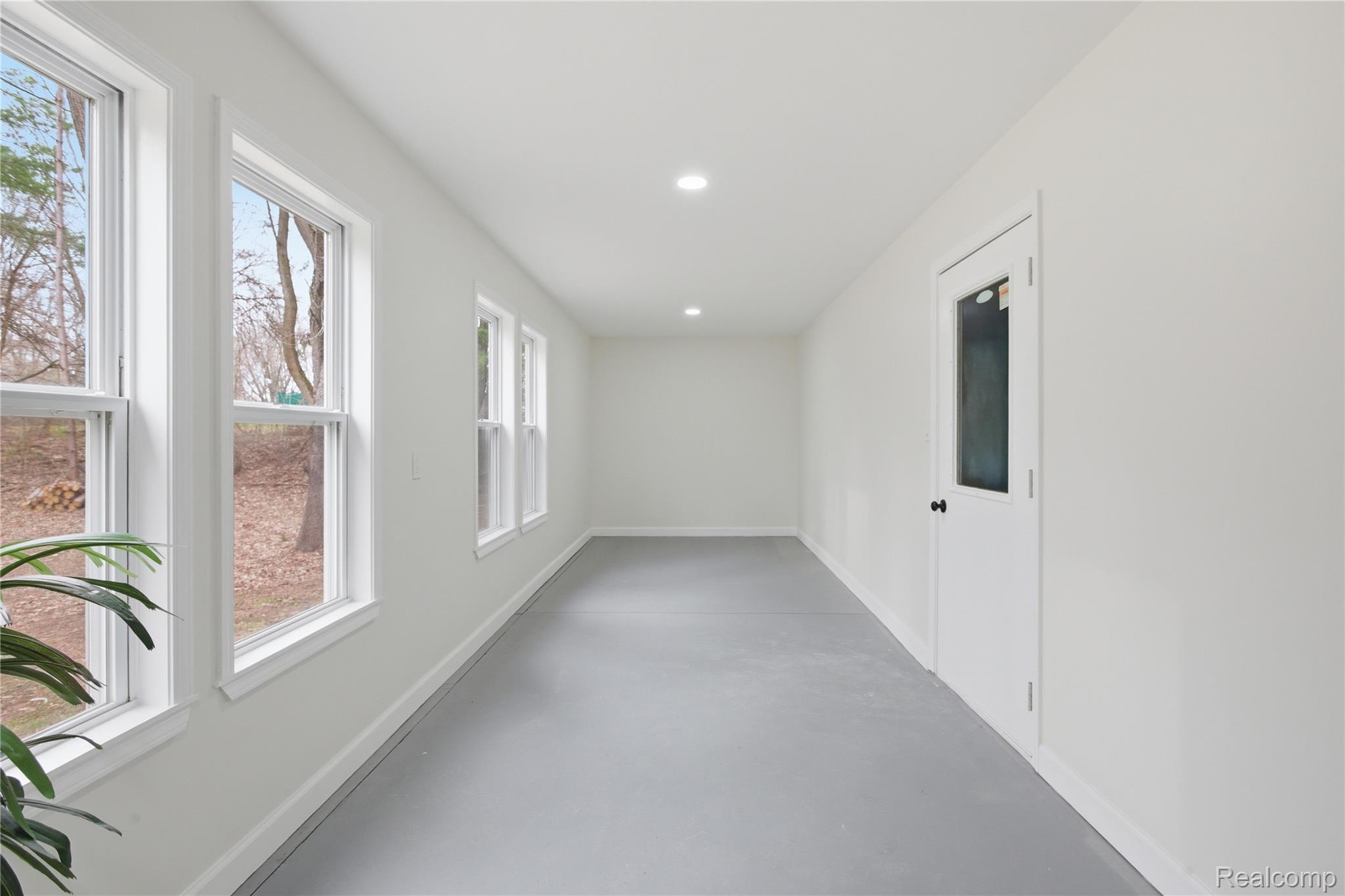5350 List Road Grass Lake, MI 49240 - Photo 42 of 71 Hallway featuring concrete floors and recessed lighting