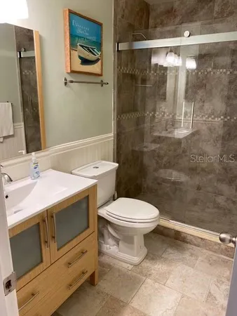 a bathroom with a sink and a toilet