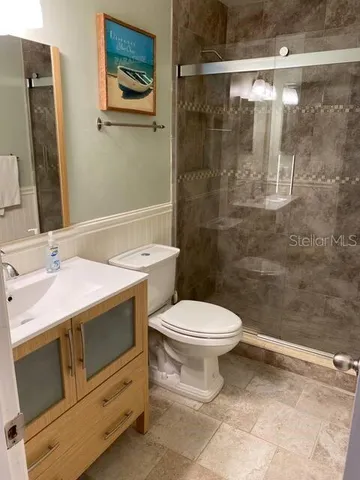 a bathroom with a sink and a toilet