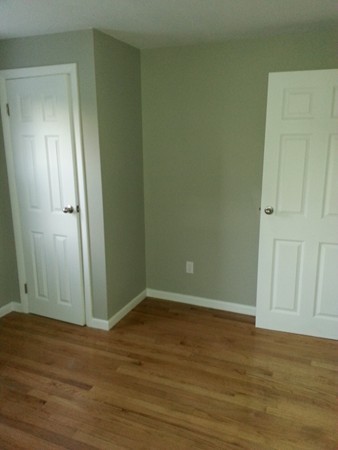 70 Starling Road Springfield, MA 01119 - Photo 18 of 25 an empty room with wooden floor