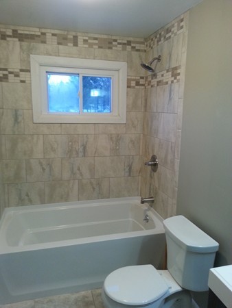 70 Starling Road Springfield, MA 01119 - Photo 5 of 25 a bathroom with a toilet bathtub and shower