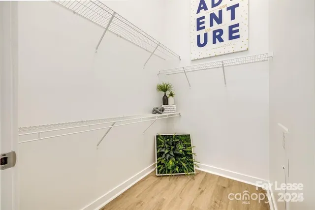 a view of small space with wooden floor