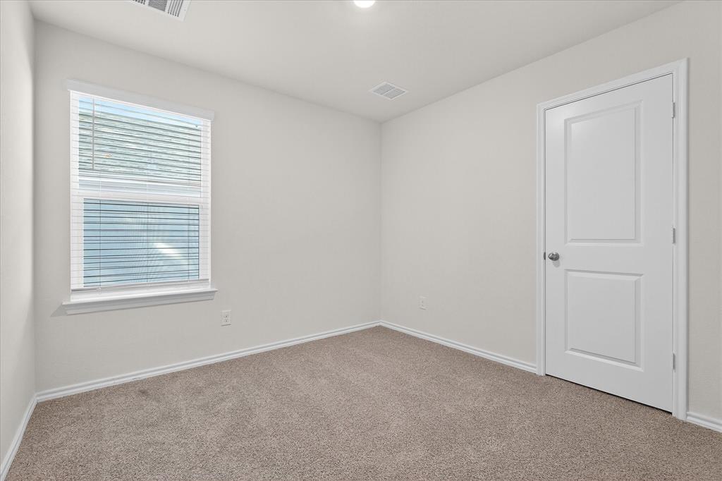 331 Clematis Street Princeton, TX 75407 - Photo 14 of 19 an empty room with a window