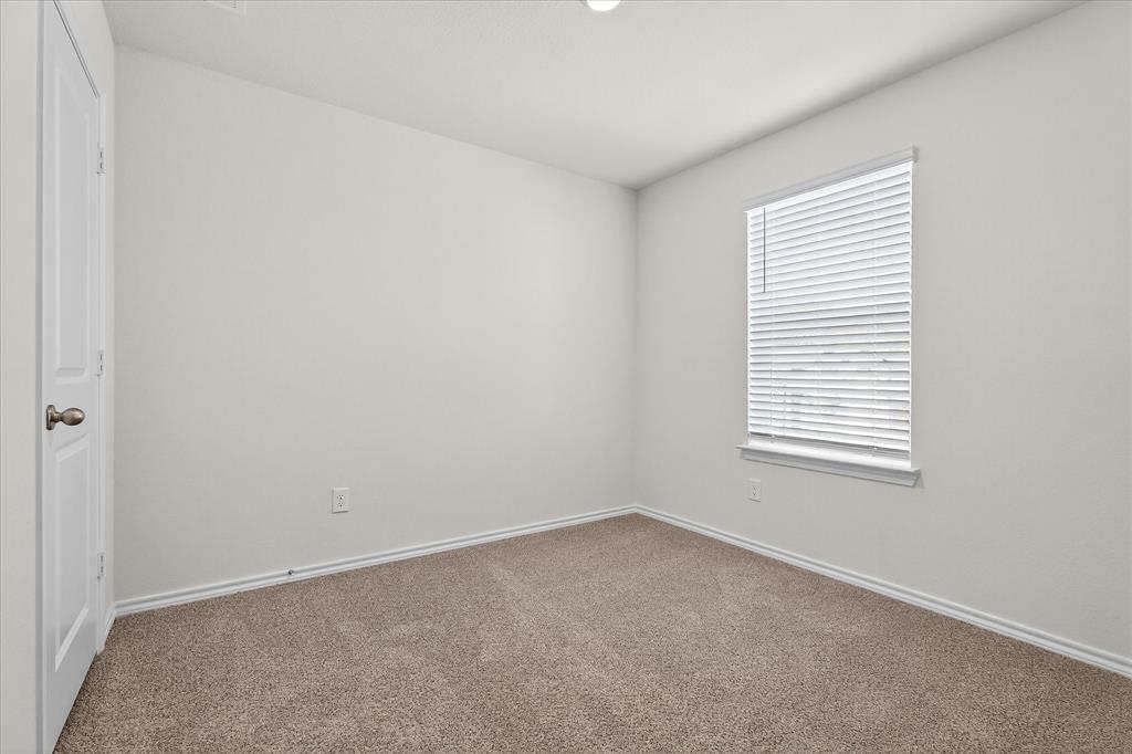331 Clematis Street Princeton, TX 75407 - Photo 15 of 19 an empty room with a window