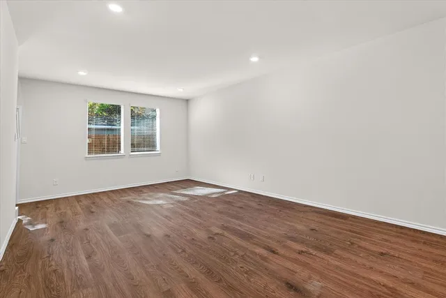 a view of kitchen with wooden floor
