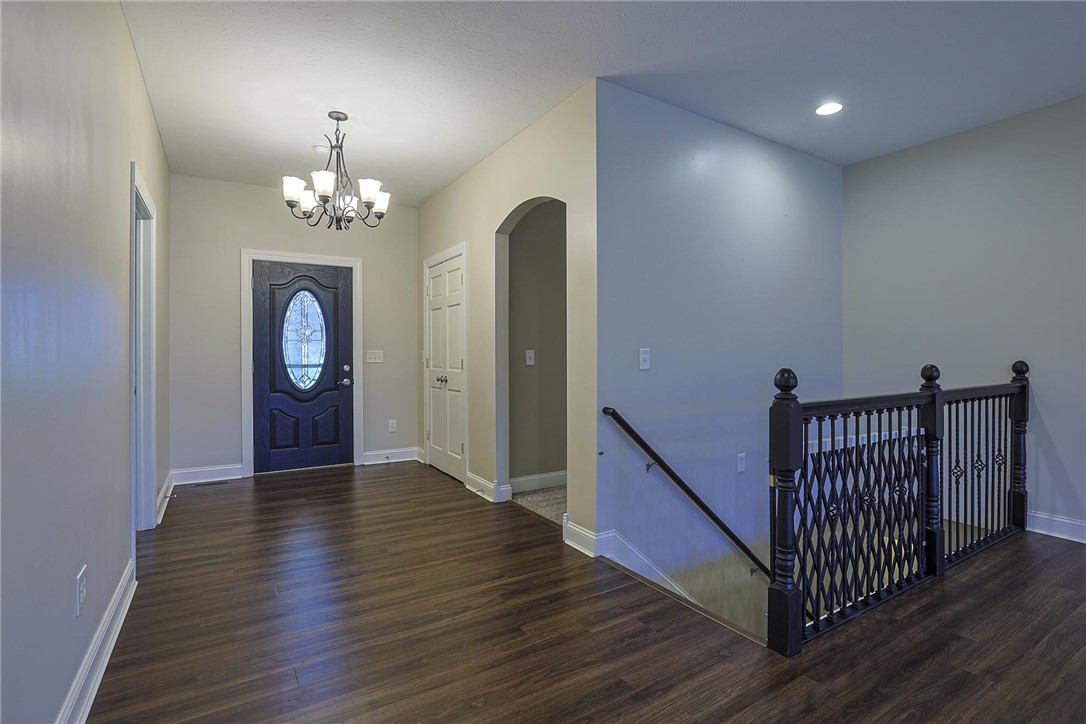 3681 Wilmington Road Lebanon, OH 45036 - Photo 24 of 87 Enter into a welcoming foyer featuring rich flooring and inviting arched doorways.