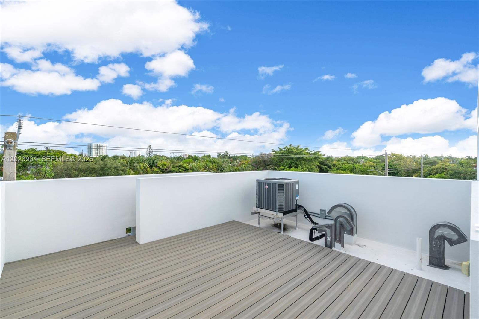 721 Southwest 11th Street, Unit G Miami, FL 33129 - Photo 33 of 40 a view of a terrace with furniture and a yard