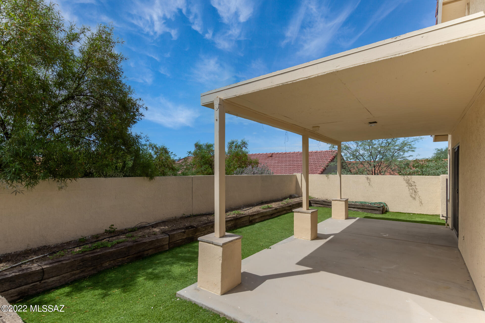 4697 West Weathervane Street Tucson, AZ 85741 - Photo 24 of 25 a house view with a garden space