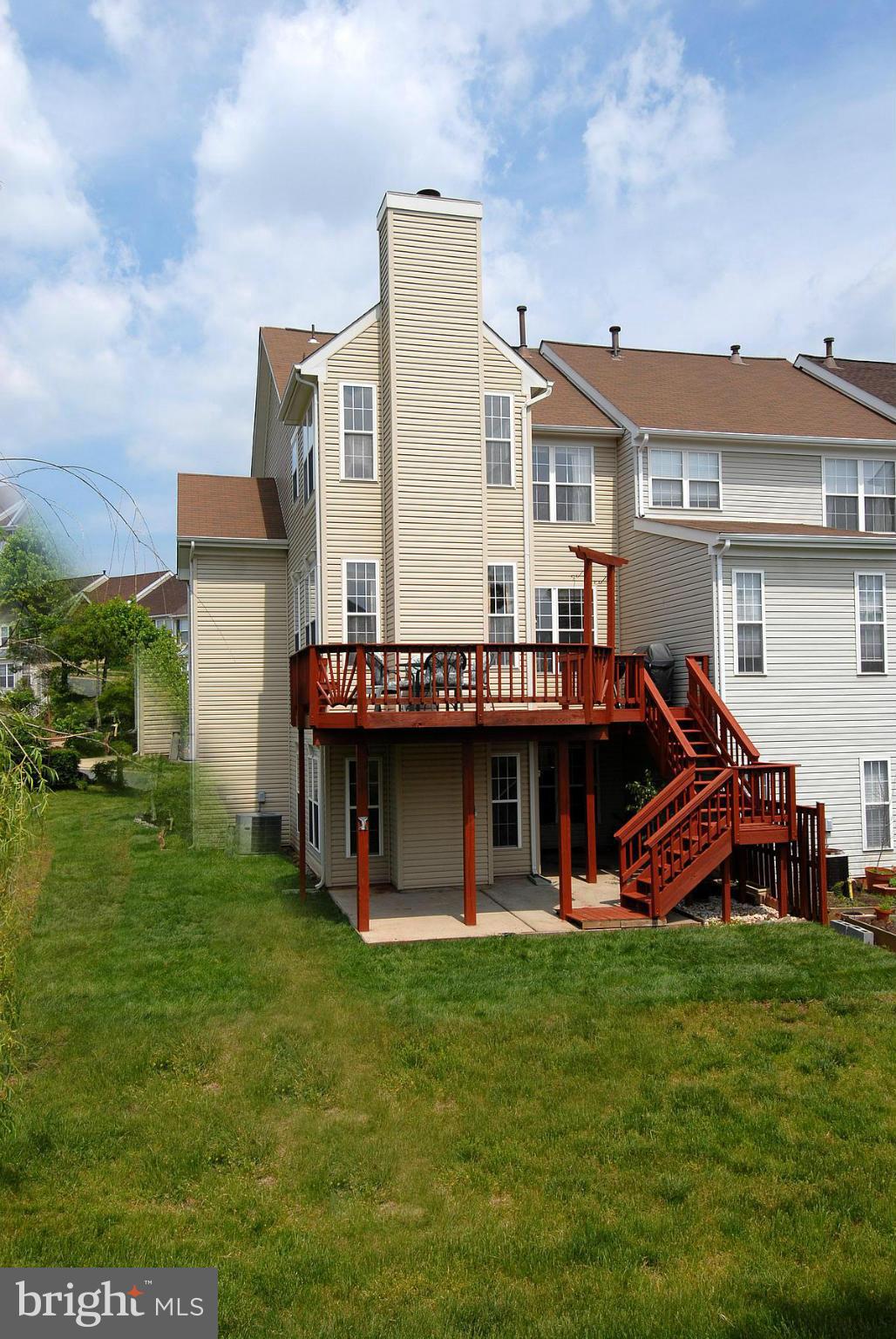 44047 Rising Sun Terrace Ashburn, VA 20147 - Photo 16 of 30 a view of a house with a backyard