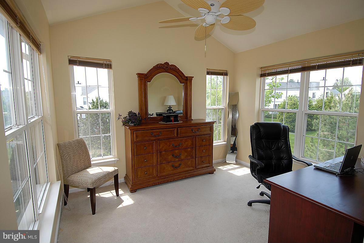 44047 Rising Sun Terrace Ashburn, VA 20147 - Photo 20 of 30 a view of a workspace with furniture and a window
