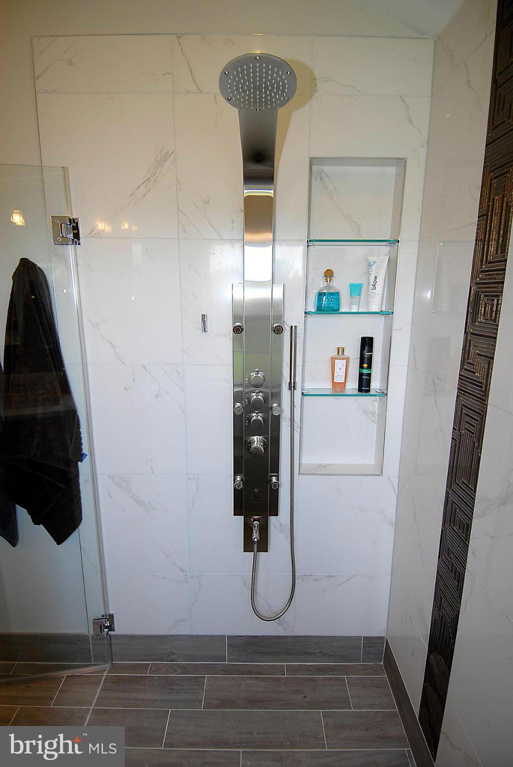 44047 Rising Sun Terrace Ashburn, VA 20147 - Photo 22 of 30 a bathroom with a shower