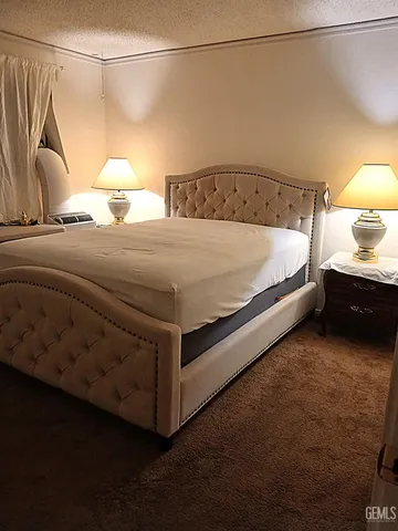 a bedroom with a bed and a walk in closet