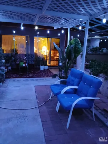 a living room with lots of furniture and a rug