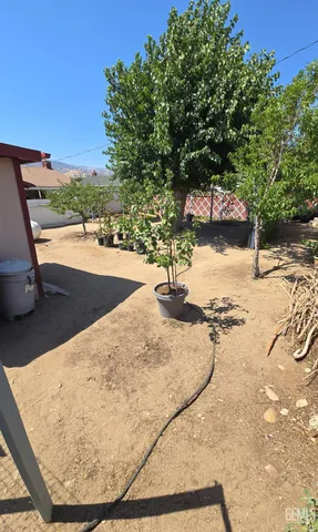 a view of a swimming pool with an outdoor space and seating area