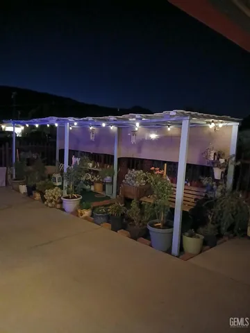 a view of a building with potted plants