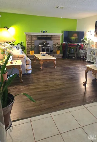 a living room with patio furniture