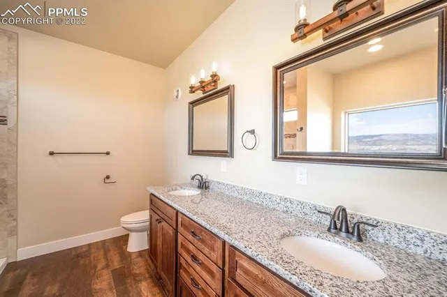 a bathroom with a tub and shower