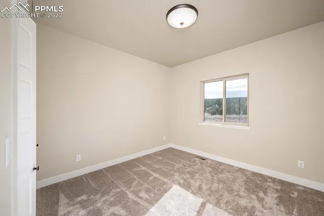 a view of a livingroom with wooden floor