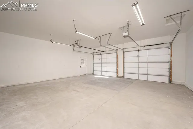 a view of a street with an ocean view