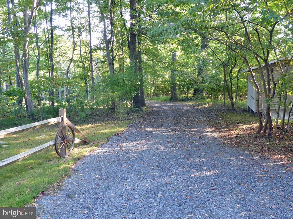 135 Farm Ridge Road Front Royal, VA 22630 - Photo 10 of 50 There is also RV/trailer space behind the shed