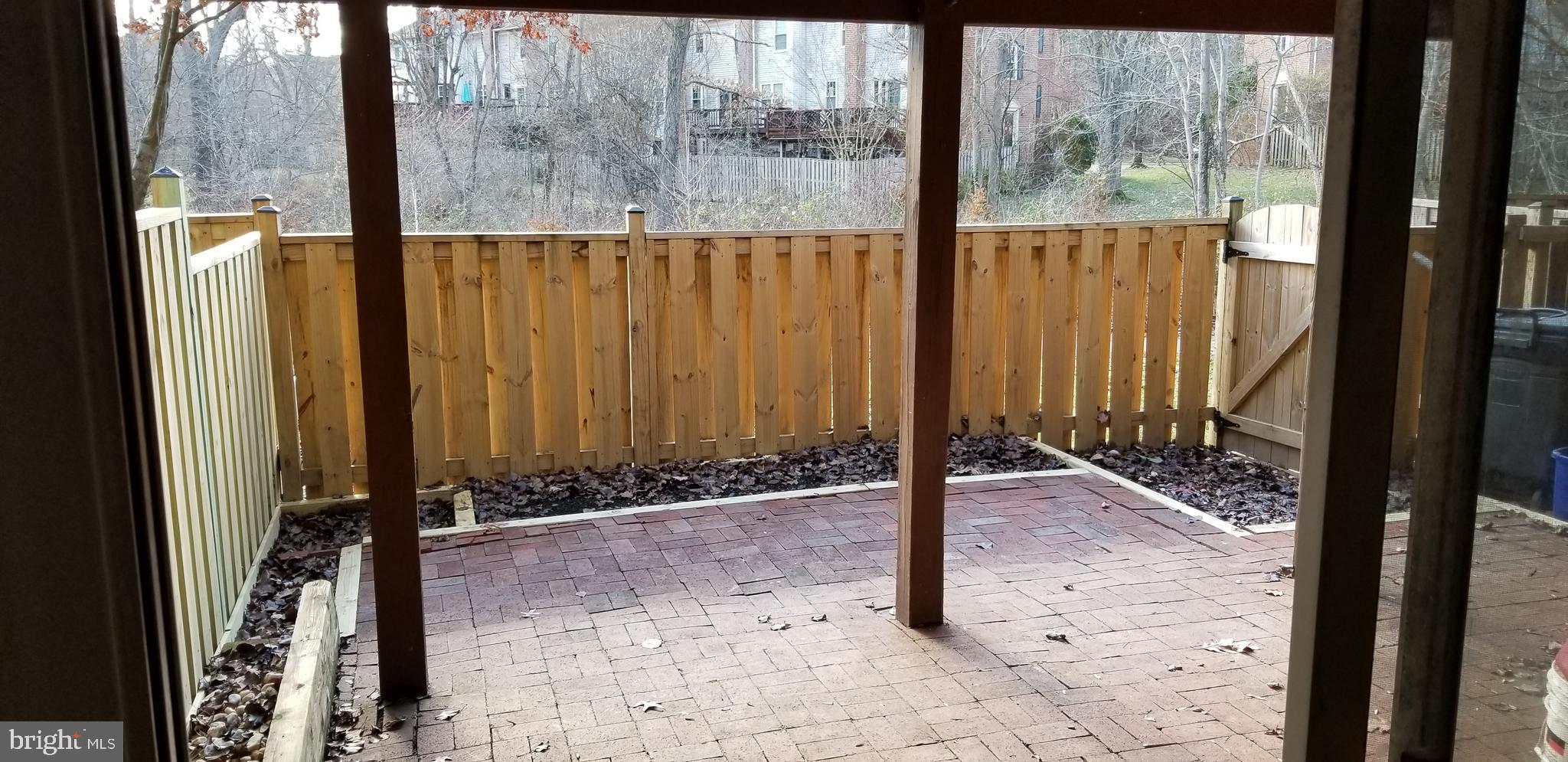 7728 Gromwell Court Springfield, VA 22152 - Photo 12 of 16 Walks out to a fenced in brick patio
