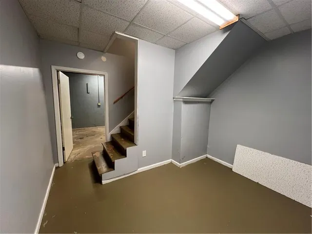 a view of a balcony with yard